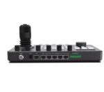 Sala de reunião equipada com mesa controladora e câmeras de videoconferência Macsym